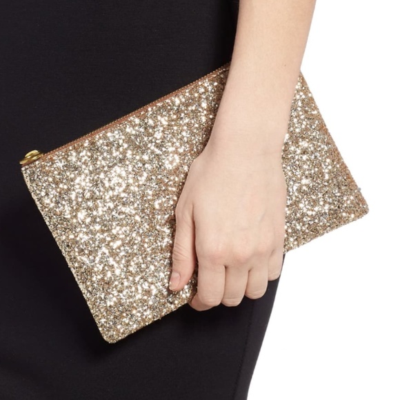 Madewell Handbags - NWT Madewell Leather Pouch Clutch in Gold Glitter